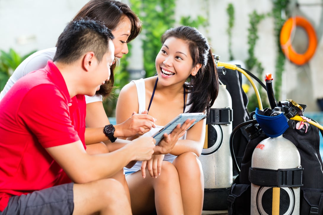 Dive Master and Students in Asian Diving School